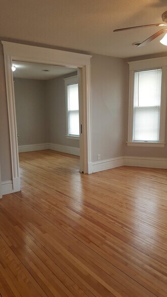Biggest bedroom in front of house with sliding doors. - 3228 3rd Ave S