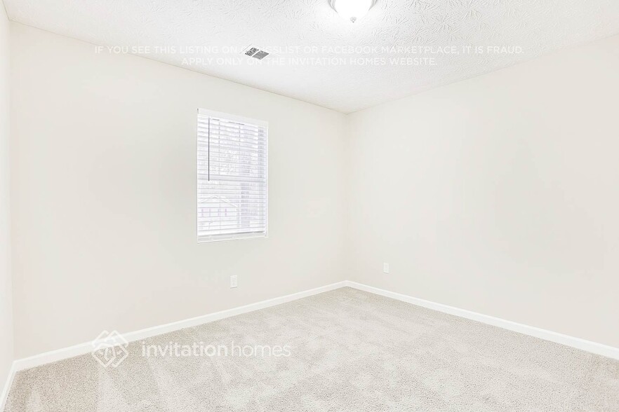 Building Photo - 50 Hidden Ridge Dr