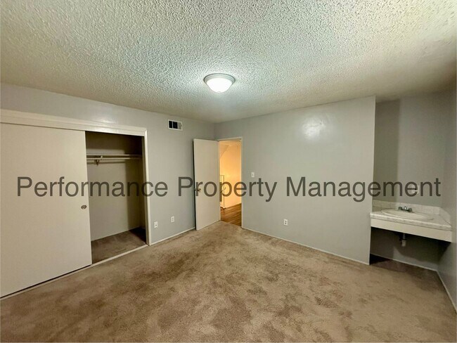 Building Photo - Cute 2 Story Condo in SW Bakersfield w/ Pool, RBP & $0 Deposit Option