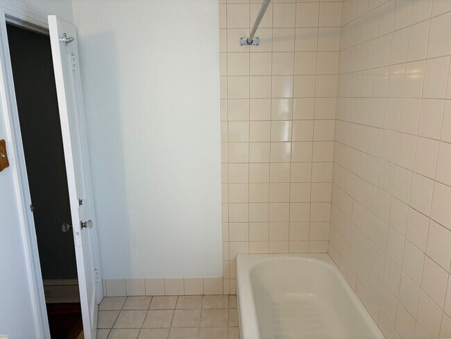 Building Photo - Elegant 3 Story Brick Corner Property Now Available