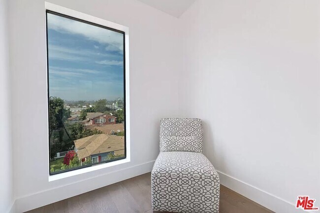 West-facing picture window on the 4th level - 6077 Hargis St