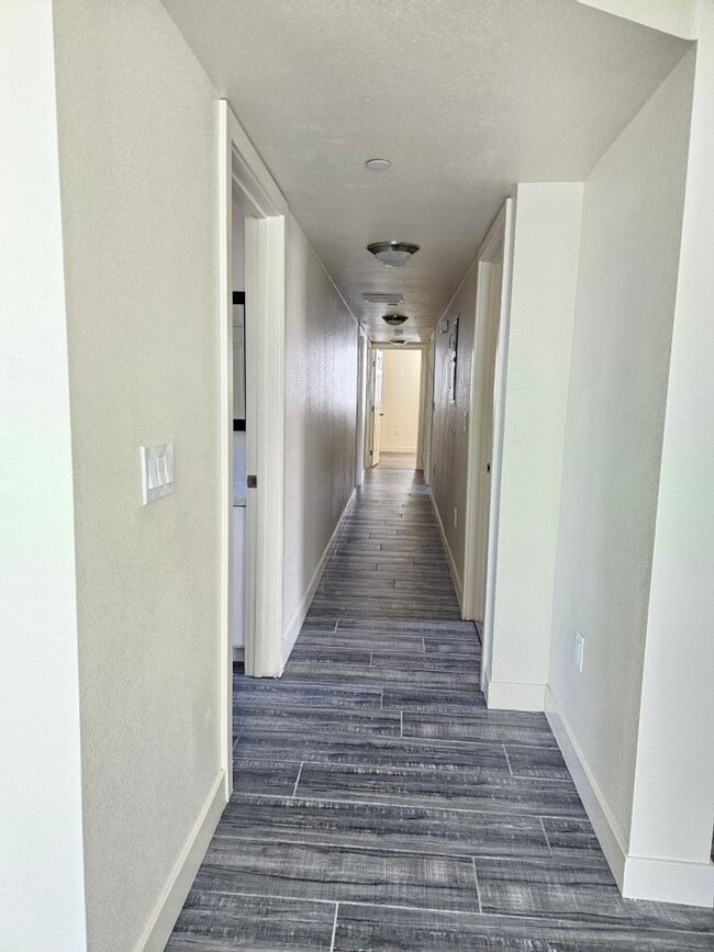 Building Photo - All Bed& Bath at 1st ,2 car Assigned Parking Space at back with access alley,tile &laminate floor...