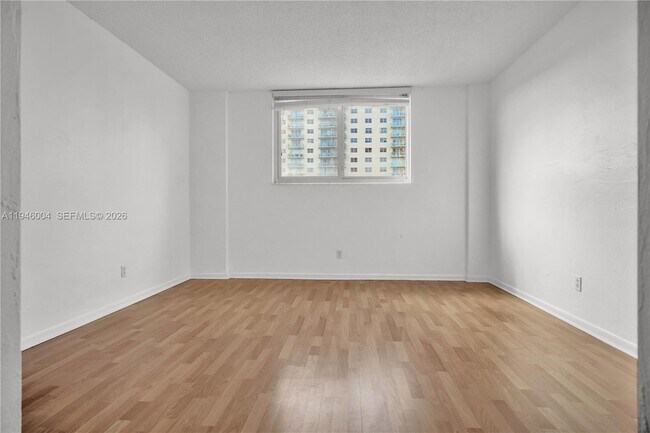 Building Photo - 19380 Collins Ave