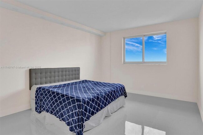 Building Photo - 19380 Collins Ave