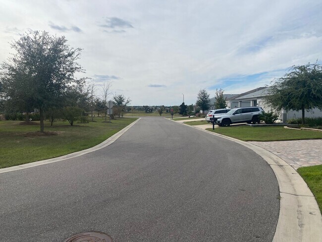 Building Photo - Three Bedroom Home In Gated 55+ Exclusive ...