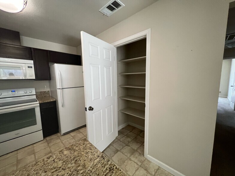 Building Photo - 4803 Lewis Carroll Way