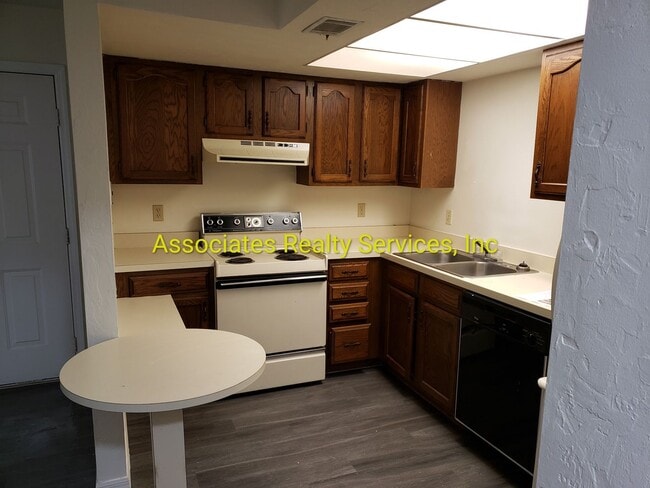 Building Photo - Creek Side Villas, 1 Bedroom featuring a FIREPLACE & DOUBLE BALCONY