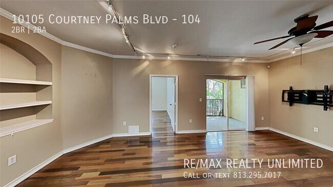 Building Photo - 10105 Courtney Palms Blvd