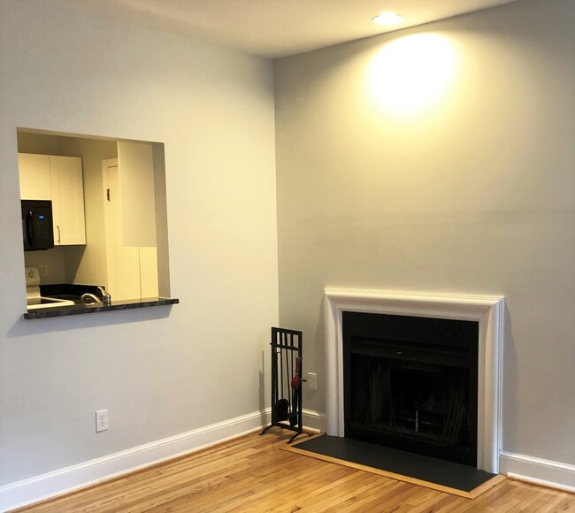 Fireplace and view into the kitchen - 301 G St NE