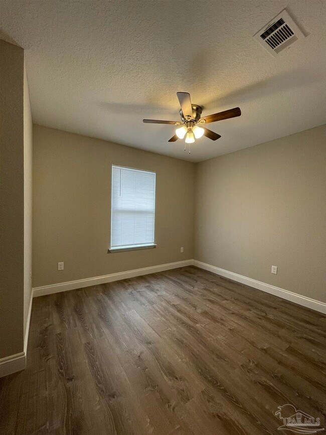 Building Photo - 6868 Branding Iron Ln