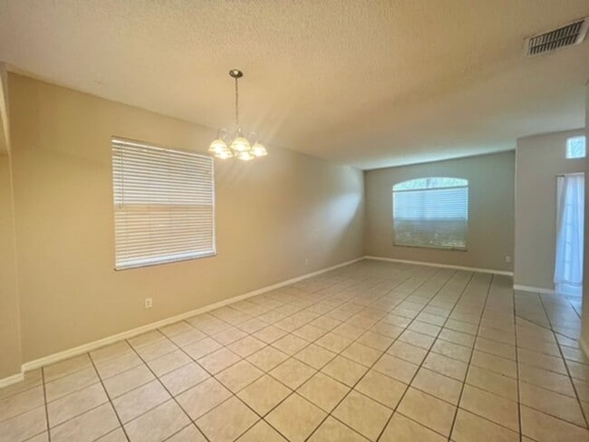 Building Photo - Spacious 4-Bedroom, 2-Bathroom Home for Re...