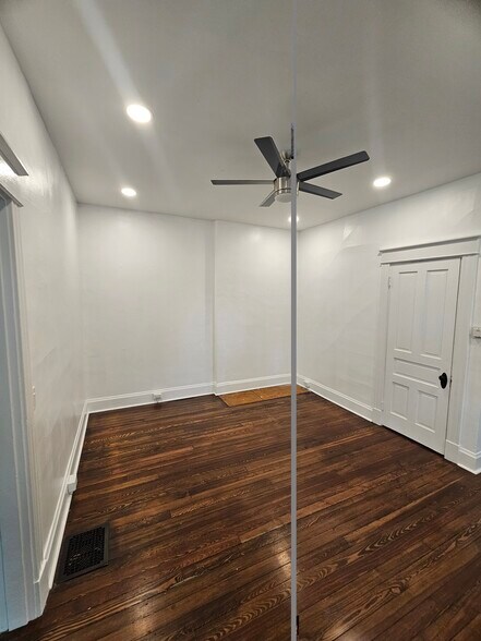 Family room/bedroom. - 3914 S Madison Ave