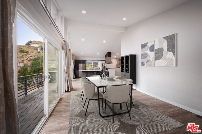 Building Photo - 8657 Valley Flores Dr