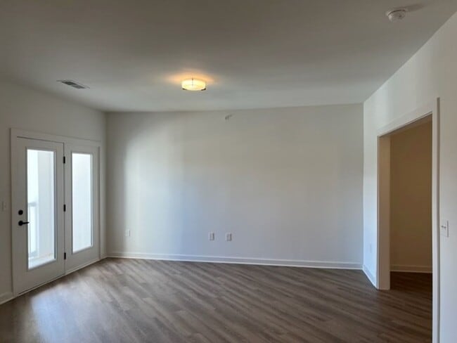 Building Photo - Beautiful New Construction in Gated Community within Minutes to Downtown!