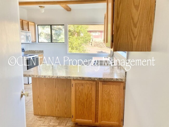 Building Photo - Large home with a huge yard on the West si...