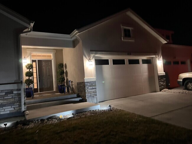 The property at night. Well lit. - 1410 Promontory Bluff Vw