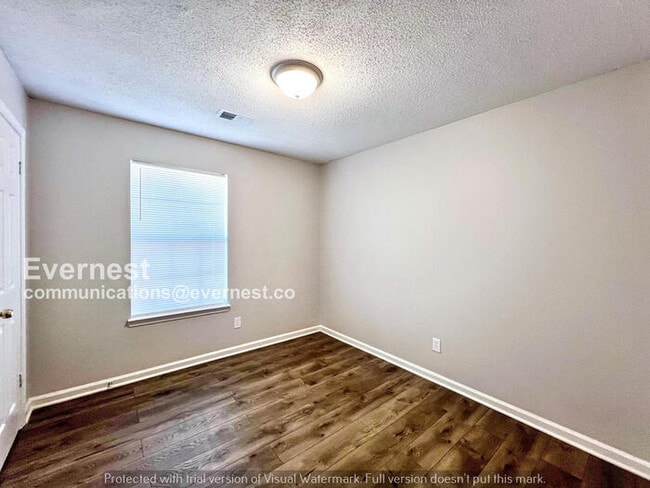 Building Photo - 7065 Village Ln