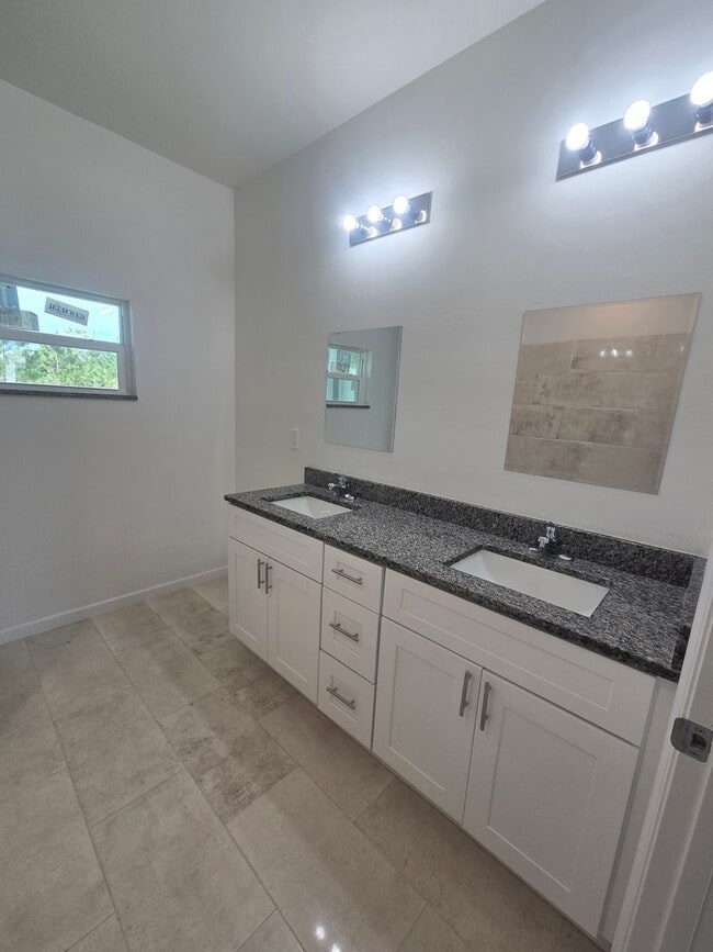 Building Photo - Brand New 3 BEDROOM 2 BATH AND ONE CAR GAR...