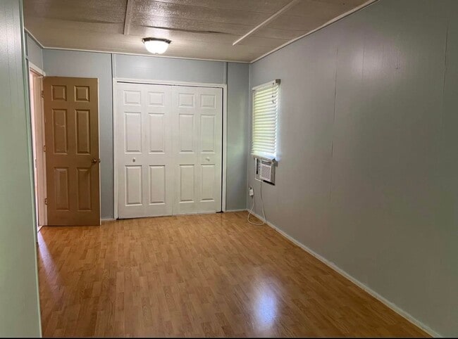 Building Photo - 2 bedroom 2 bath mobile home for rent on half acre!