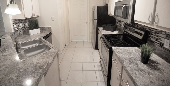 Building Photo - Gorgeous  Forest View, Wood Floors  1/1 condo for RENT @The Crest close to UCF.