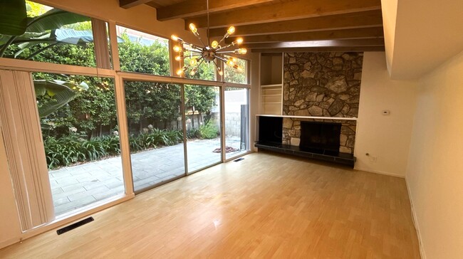 Living room with floor to ceiling windows - 11620 Dunstan Way