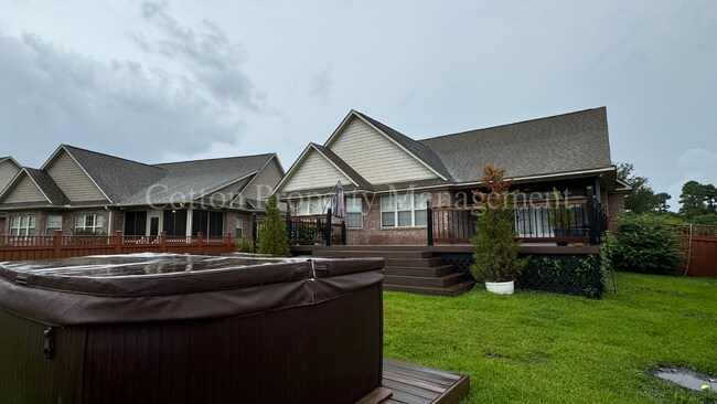 Building Photo - 4BR/3BA Well appointed home in the gated c...