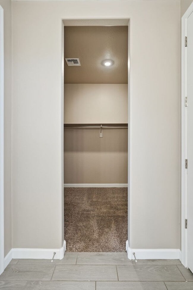 Building Photo - Spacious 5-Bedroom Home with Open Floor Plan & Private Backyard