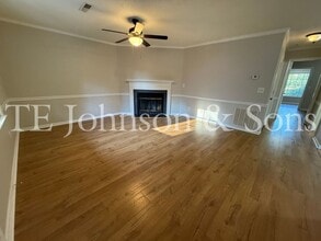 Building Photo - Charming 3-Bedroom with Fireplace & Modern...