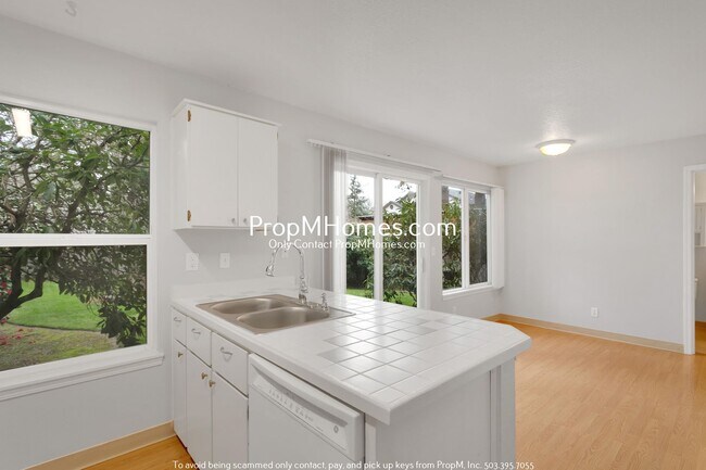 Building Photo - Three Bedroom Aloha Home with Park-Like Backyard!