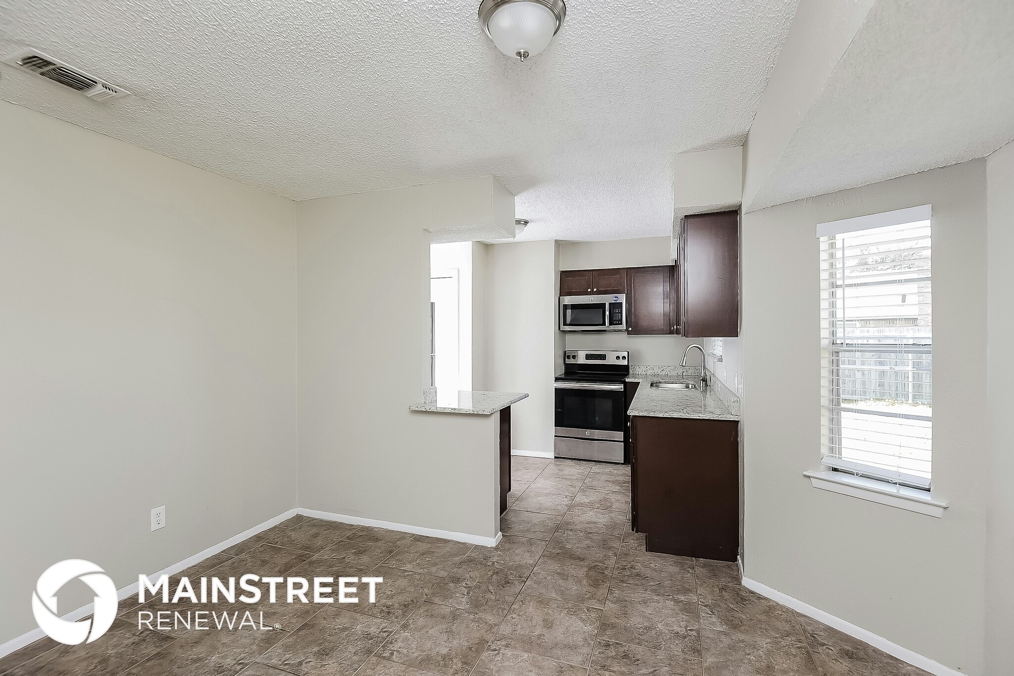 Building Photo - 8805 Main St