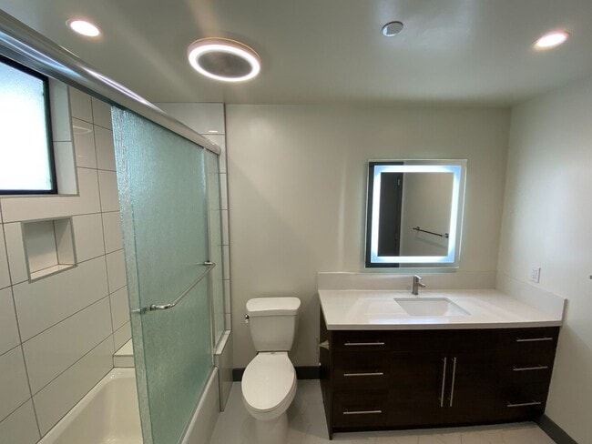 Building Photo - NEW SMART*4BD*4BA*TOWNHOME/ROOF DECK*CENTRAL AIR/HEAT*STAINLESS STEEL APPLIANCES*WASHER/DRYER IN ...