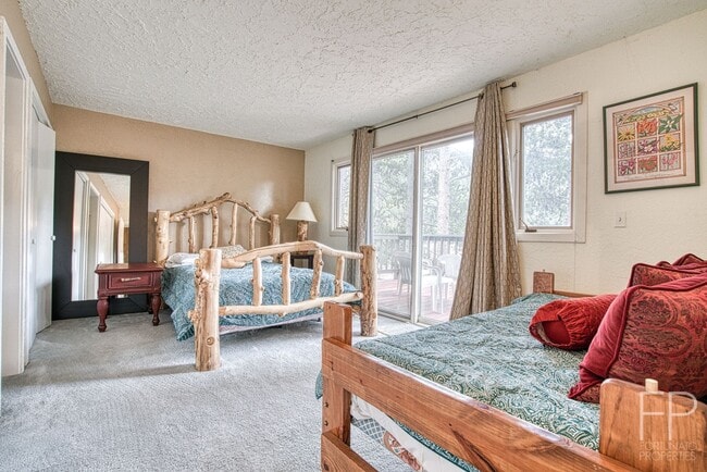Building Photo - On the Blue River!  HUGE 4 Bedroom home, Furnished Updates throughout!  Bus route!  Spacious parking