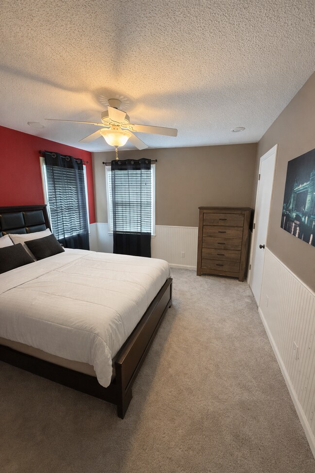 Building Photo - 4 Bed Lenexa Home w/ Finished Basement, Solar, 3 Car Garage and Fenced Yard!!