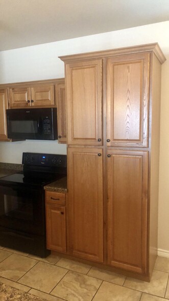 Cabinet storage in kitchen - 1305 Kings Way