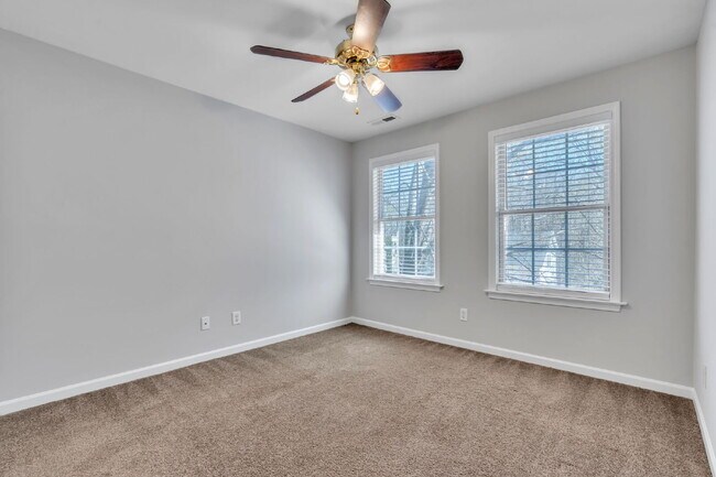 Building Photo - Beautifully Appointed 4BR Home Featuring a Screened Porch, Spacious Living Areas & Community Pool...