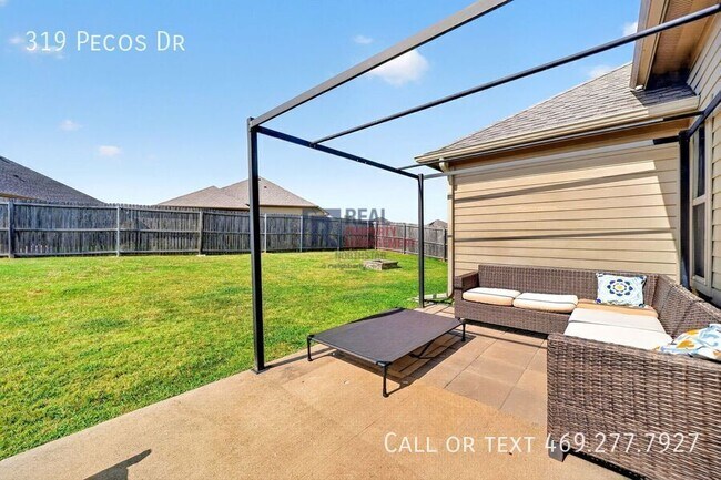 Building Photo - 319 Pecos Dr