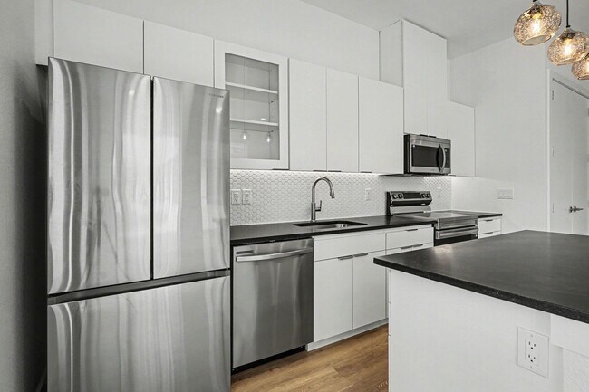 Building Photo - Be the first to live in Unit 203 at 2217 Fitzhugh—a brand-new 2026 construction offering 628 sq f...
