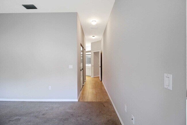 Building Photo - Annual rental: Spacious 3BR/2BA Creekwood Home with Office, Screened Lanai, EV Charger & Resort-S...