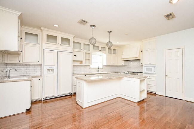 Building Photo - Discover this stunning one-story corner lo...