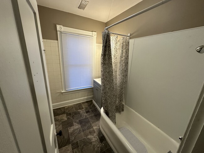 Split bathroom (shower/sink in one room and commode in adjoining room) - 229 S B St