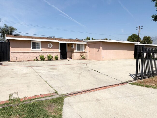 Building Photo - Gated Main House with Private Backyard & Bonus Room