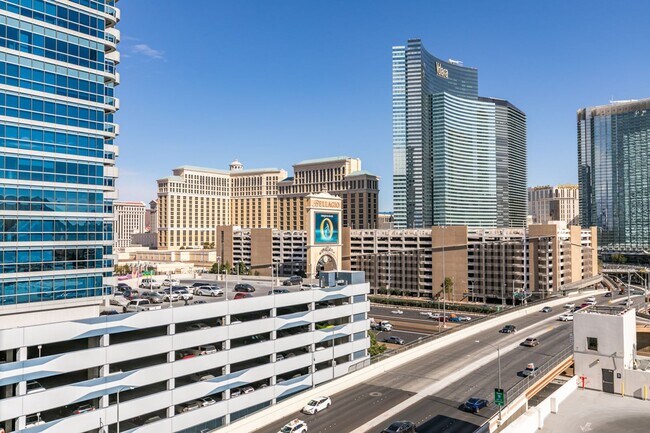 Building Photo - Iconic Strip-View Luxury | Elegant 1BR + Den High-Rise Residence