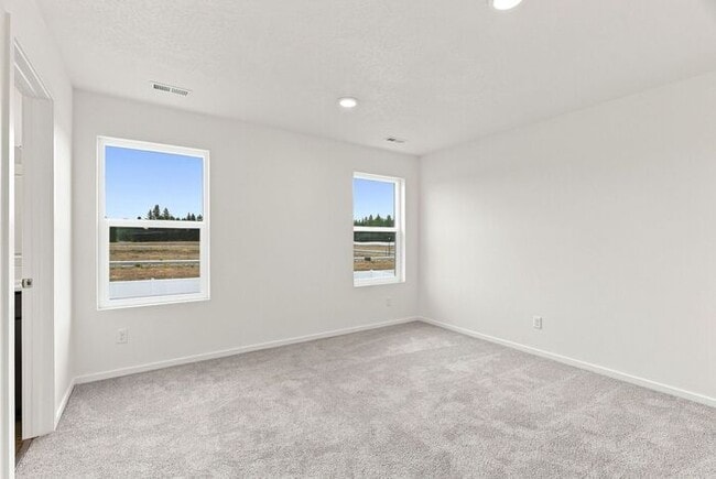 Building Photo - Spacious 5-Bedroom with Loft with 3-Car Garage