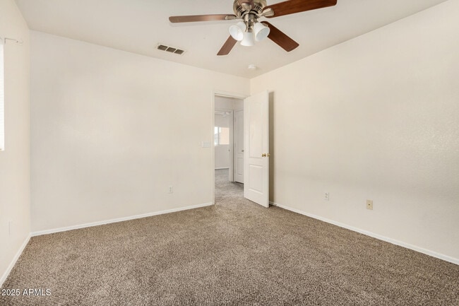 Building Photo - 15554 W Gelding Dr