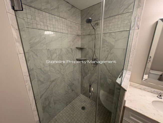 Building Photo - Fully Redesigned Townhouse Style Condo For Rent in Desirable Louisquisset Community!