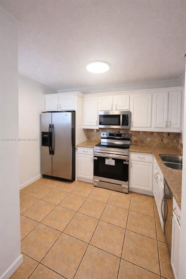 Building Photo - 15761 SW 137th Ave
