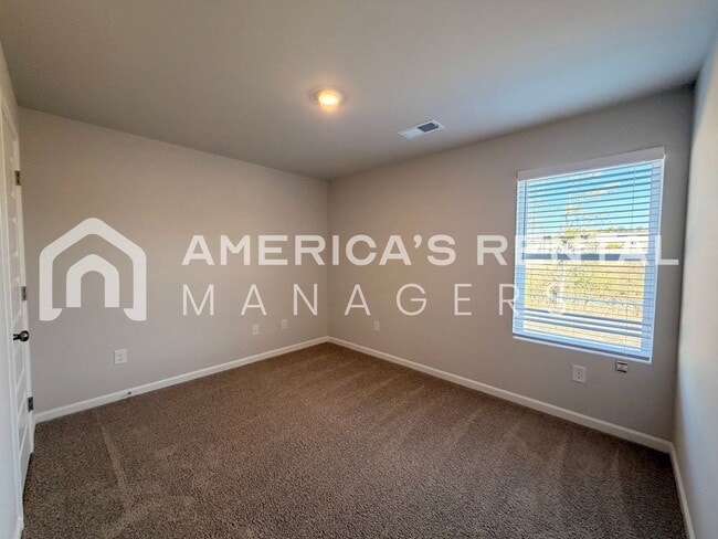 Building Photo - Spacious Two-Story Townhome with Open Layout!