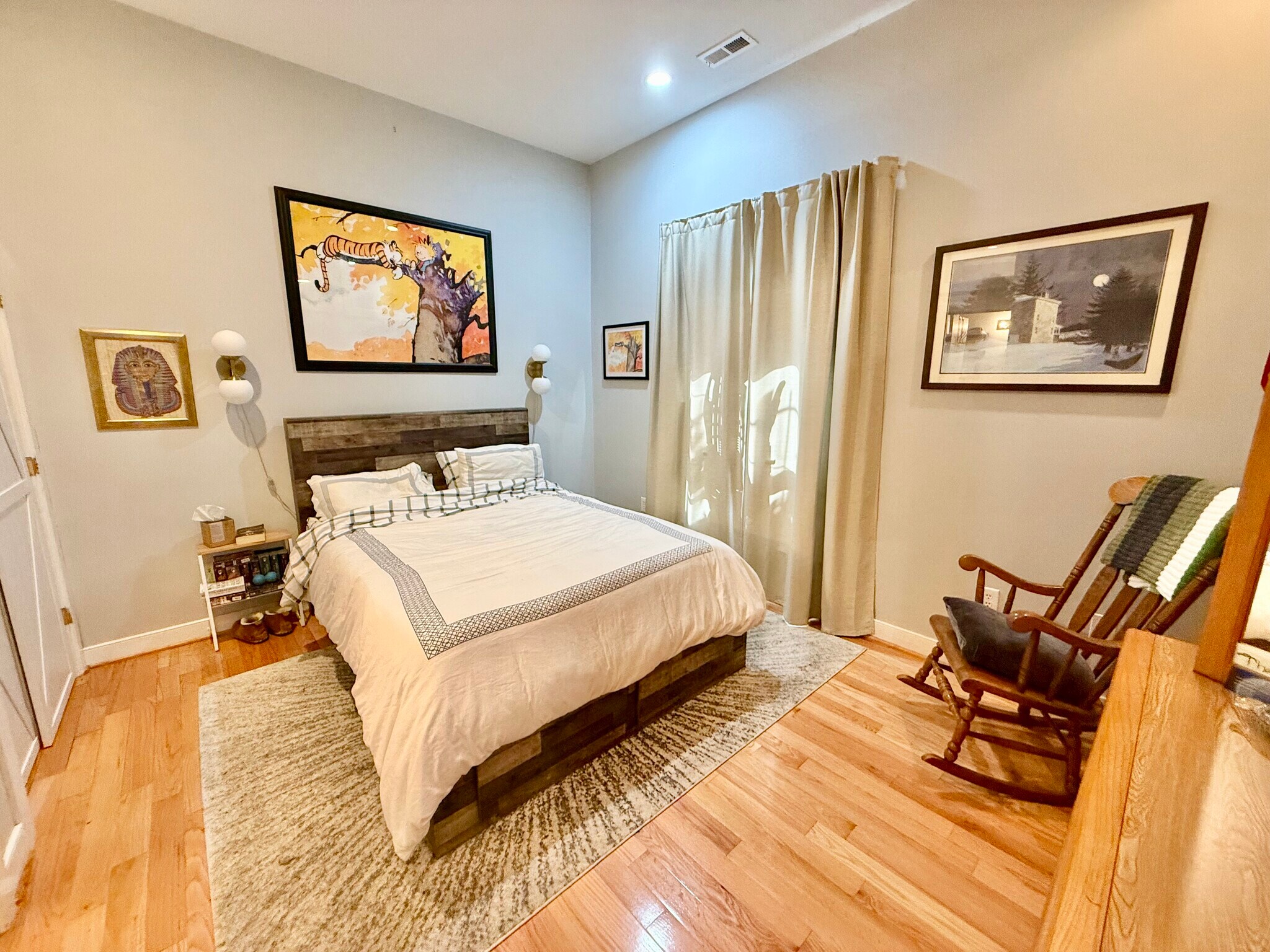 Bedroom with full-height window. It looks out onto the recessed patio, meaning sunlight with privacy - 1240 4th St NW