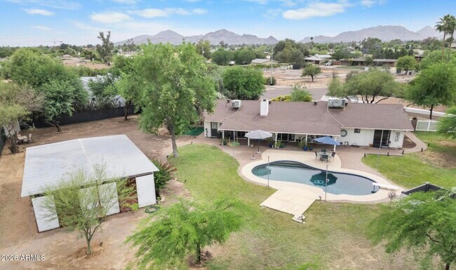 Building Photo - 7026 E Sunnyside Dr