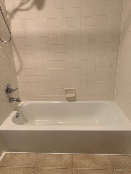 New bathtub - 3555 S Downing St